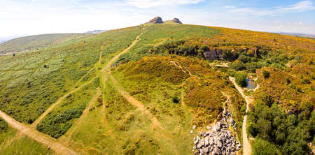 A view of Haytor Rocks in Dartmoor National Park is a vast moorland in the county of Devon, in southwest England, UKの写真素材