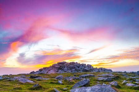 Sunset view of Dartmoor National Park, a vast moorland in the county of Devon, in southwest England, UKの写真素材