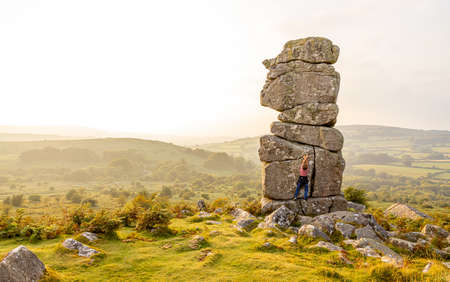 A view of Bowerman's nose in Dartmoor National Park, a vast moorland in the county of Devon, in southwest England, UKの写真素材