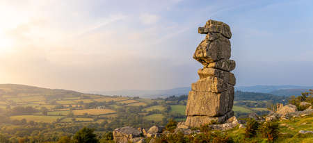 A view of Bowerman's nose in Dartmoor National Park, a vast moorland in the county of Devon, in southwest England, UKの写真素材