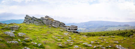 Sunset view of Dartmoor National Park, a vast moorland in the county of Devon, in southwest England, UKの写真素材