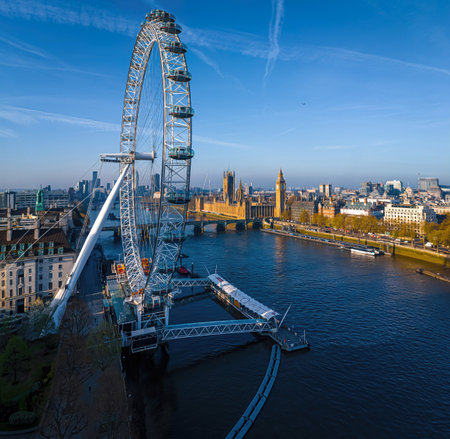 Iconic London skyline with London Eye in morning light over the Thamesの写真素材