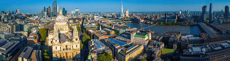 Aerial cityscape of central London featuring St. Paulâs Cathedral, classic architecture, and modern buildings. Ideal for travel, tourism, architecture, and real estate usesの写真素材