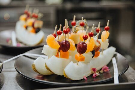 The original presentation of sliced fresh and juicy fruit.の写真素材