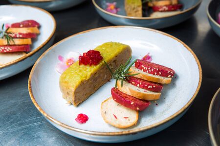 Duck terrine with autumn fruit and red wine jelly.の写真素材