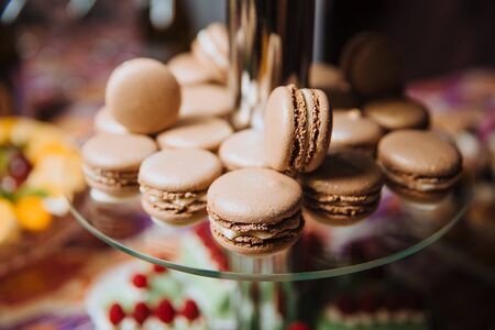 The macaroons are on the dessert rack.の写真素材