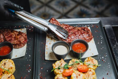 A juicy grilled meat steak.の写真素材
