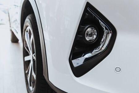 The front fog lights of the car are white. Front view.の写真素材