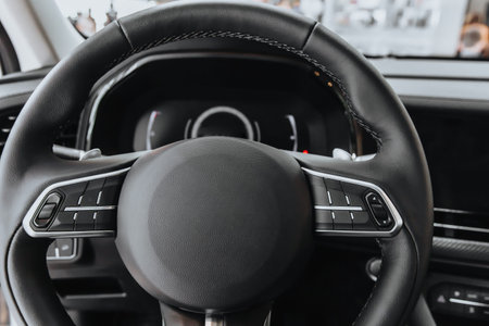 Steering Wheel and Dashboard of the Car in black.の写真素材
