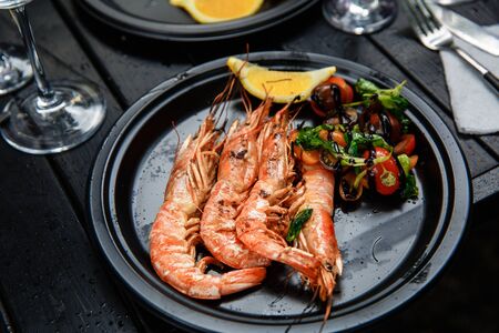 Langoustines cooked with vegetables.の写真素材
