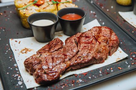 A juicy grilled meat steak.の写真素材