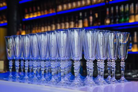 Empty wine glasses on the tableの写真素材