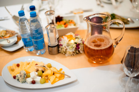 Cheese plate on a table.