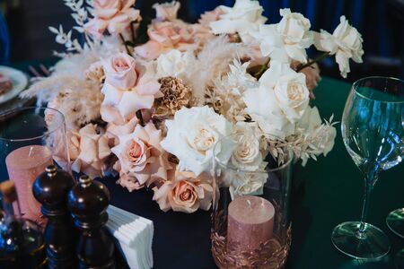  Elegant banquet table setting with flowers and candles.の写真素材