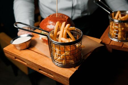 Delicious burger with french fries.の写真素材