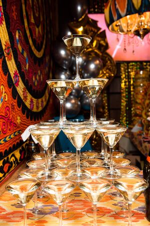 A tower of champagne glasses .の写真素材