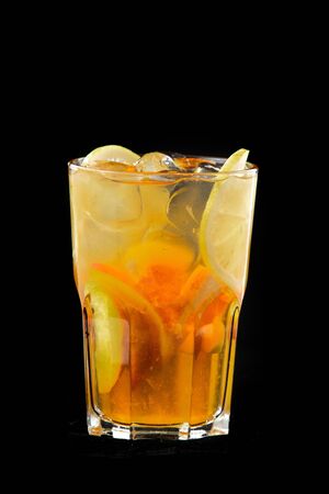 Fresh cocktail of orange and lemon in a glass.の写真素材