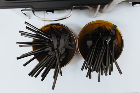 Black plastic cutlery.