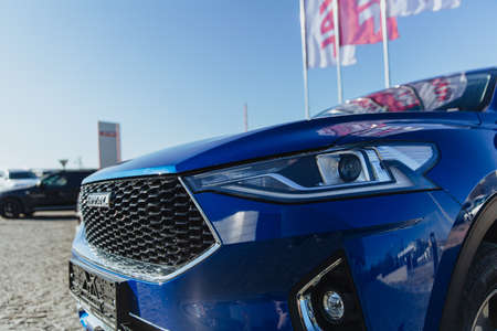 Zaporozhye/Ukraine- November 10 2019 :Headlight Of A Modern Car. The car is blue.のeditorial素材