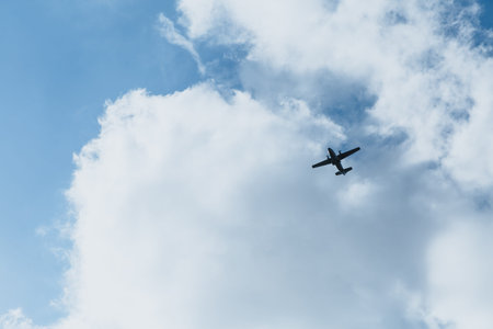 Airplane in the sky on a sunny day.