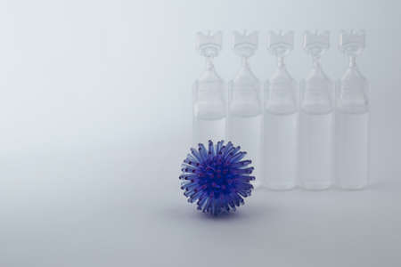 Abstract model of a virus infection and medicine on a grey background.の写真素材
