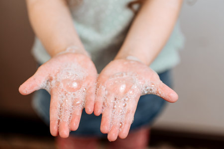 Hands of a girl in soap.Clean hand concept idea.