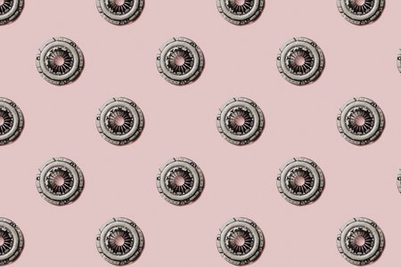 Car clutch disc on a pink background. Auto parts. Patternの写真素材
