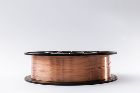Welding wire spool on a white background
