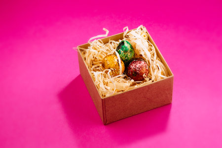 Three multi-colored easter eggs.の写真素材