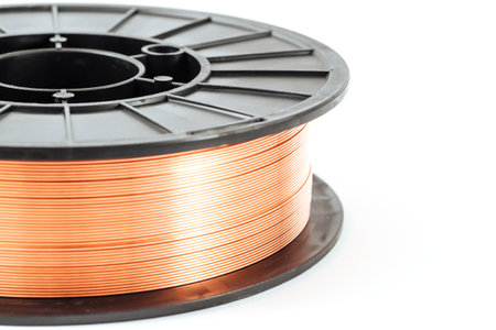 Welding wire spool on a white backgroundの写真素材