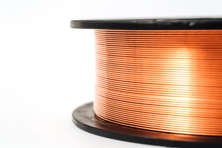Welding wire spool on a white backgroundの写真素材