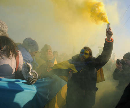 Participants of the action `Unite the banks of the Dnieper` a living chain of` Unity` on the Paton Bridge in Kiev, January 22, 2019.のeditorial素材