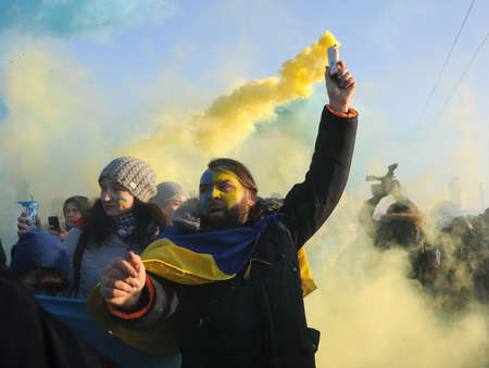 Participants of the action `Unite the banks of the Dnieper` a living chain of` Unity` on the Paton Bridge in Kiev, January 22, 2019.のeditorial素材