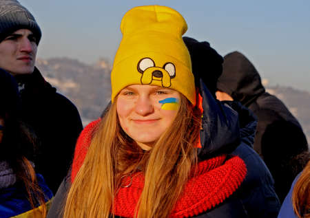 Participants of the action `Unite the banks of the Dnieper` a living chain of` Unity` on the Paton Bridge in Kiev, January 22, 2019.のeditorial素材