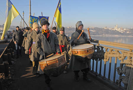 Participants of the action `Unite the banks of the Dnieper` a living chain of` Unity` on the Paton Bridge in Kiev, January 22, 2019.のeditorial素材
