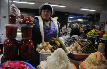 Counter with pickles in the covered part of the Vladimir market in Kiev, January 22, 2019.のeditorial素材