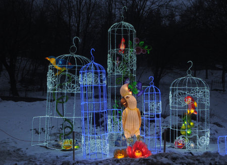 Parrot lanterns in a cage during the Festival of Giant Chinese Lanterns at the Singing Field in Kiev, February 14, 2019.のeditorial素材