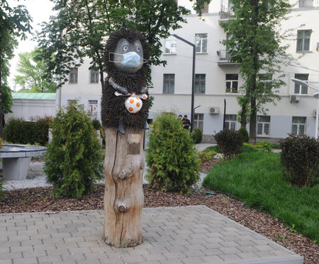 The sculpture "Hedgehog in the Fog" in a medical mask, in Kiev, May 26, 2020のeditorial素材