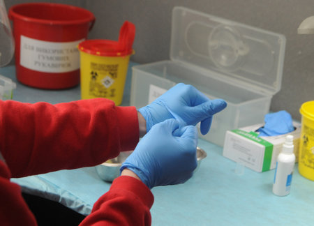 Testing of employees of the Center for Emergency Medicine and Disaster Medicine of Kiev for coronavirus by ELISA tests to detect antibodies to the virus, in Kiev, May 26, 2020のeditorial素材