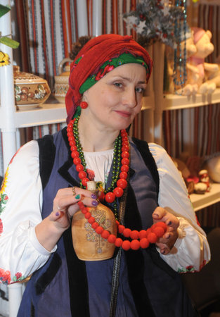 Woman with beads at the 26th Kiev International Women's Club of the Charity Fair on December 8, 2018のeditorial素材