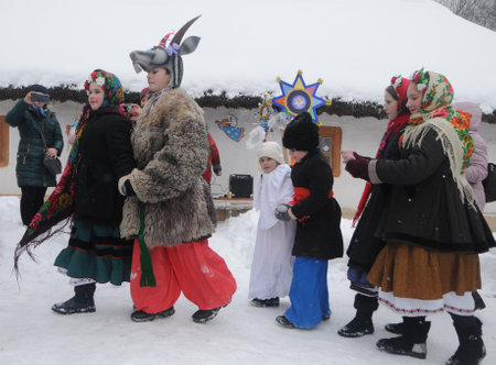 Christmas carols during the Christmas celebration at the National Museum of Folk Architecture and Life in Kiev, January 7, 2019.のeditorial素材