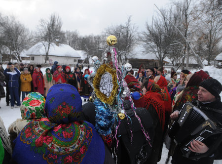 Christmas carols during the Christmas celebration at the National Museum of Folk Architecture and Life in Kiev, January 7, 2019.のeditorial素材