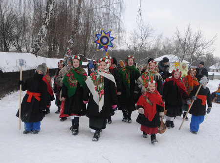 Christmas carols during the Christmas celebration at the National Museum of Folk Architecture and Life in Kiev, January 7, 2019.のeditorial素材
