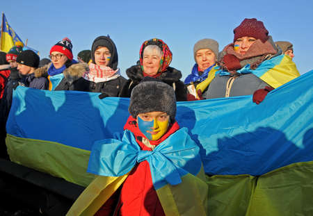 Participants of the action "Unite the banks of the Dnieper" a living chain of "Unity" on the Paton Bridge in Kiev, January 22, 2019.のeditorial素材