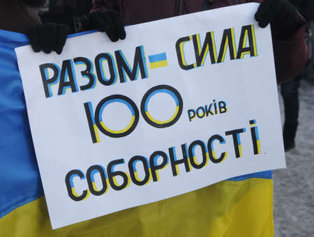 Participants of the action "Unite the banks of the Dnieper" a living chain of "Unity" on the Paton Bridge in Kiev, January 22, 2019.のeditorial素材