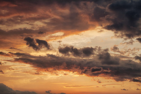 sky with clouds at sunset during storm