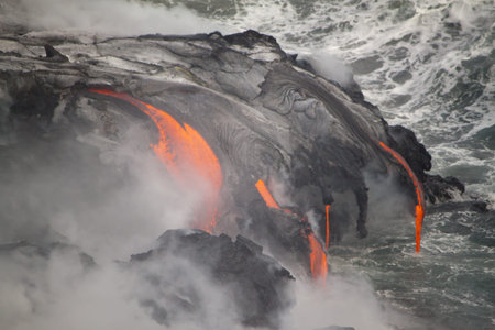Lava erupting into Pacific Ocean in Hawaii Big Islandの写真素材