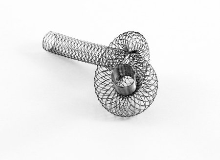 braided nitinol self-expanding stent shaped into a knotの写真素材