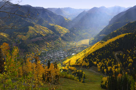 overlook over Telluride with golden, green and red aspen in Coloradoの写真素材