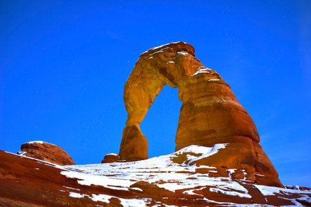 Delicate Arch at night in Arches National Park, Utah in winterの写真素材
